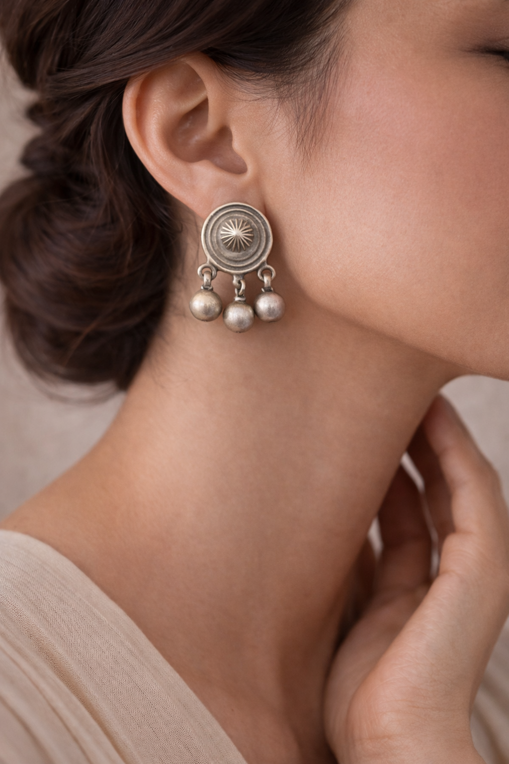 Surya Motif Silver Stud Earrings